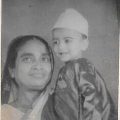 the 1 year old with his Grandmother Sudhanshubala Sarkar. Kolkata, India