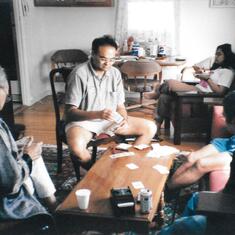 Playing bridge with his father Dr. S.K. Sarkar, Shankar Roy and Soumendu Roy. Dewitt, NY, 2001