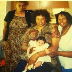 Tara with mom, Arnita Hughes, Mommy Agnes and Evan.