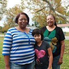 Tara with mom, Arnita Hughes and daughter, Evan.