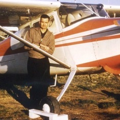 Ted in front his plane, one of three he owned throughout his life