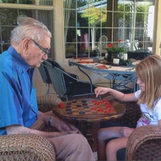 Playing chess with Sofia, his "little sweetie"