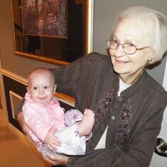 Holding her first great grandchild, Lily