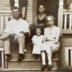 On her front step in Pittsford, Vermont with her beloved Aunt Bessie, her brother Ted, and her Uncle Henry
