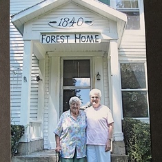 Mom and her dear cousin Till, in front of Till's home, the homestead they their grandparents built in 1840