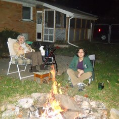 Thelma and Susan at Dexter-Pinckney Road house at the campfire.