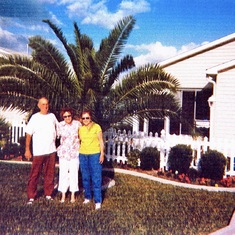 Ma, Pa, and Kathy outside their home in The Villages.