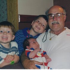 Tom with grandsons Forrest, Trevor and Skyler (1997).