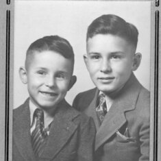 Tom, age 7, with brother Patrick Dennis, age 11.