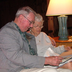 Mom Dad Looking at 50th Wedding Anniversary Album