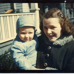 1952 Mom and Tom in blue snowsuit