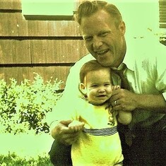 Tom with baby Russell 1962