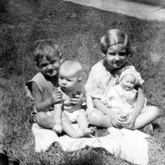Tom with Cathy, Pat with doll she won in a beauty contest, 1934c