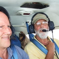 Tom, Jim skying to Osh Kosh