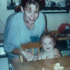 Me making a mess of Tommy on his first birthday with his cake