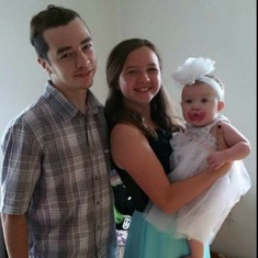 Aubrey with her godparents on her christening day
