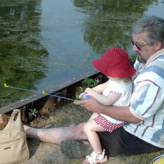 Teaching baby girl to fish