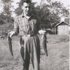 Tom's dad, Tim, the fishing master.  
Oh, my . . . what a strong resemblance between Tom and his dad.