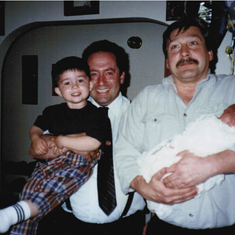 Tom's brother Jim with nephews Alex and Kyle Thomas (being held by Tom)