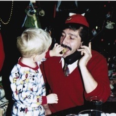 Josh & Papa making a call to Santa Claus