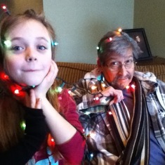 Posted at the request of Gabby from her cellphone pics:  Gabby and Papa all decorated for Christmas, 2011.   Often, over the past few years, I heard, "Hey, Papa, let's . . . . "   I love this pic.  He never ever said no to his grandchildren.