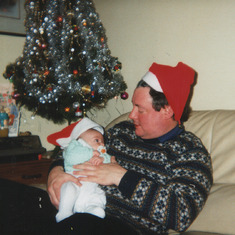 Tom and baby James at Christmas 1995