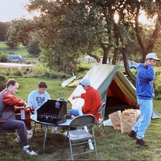 Tim in his high school letterman’s jacket. Camping with the boys in Wales