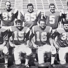"Golden Gator Gridders" End Neil Shea, No. 81: Linebacker Dennis Drucker, No. 65; Wingback Mike Burke, No. 5; Tackle Paul Richards, No. 72  (Front Row) Boby Murphy, No. 21; Defense back Tim Tierney, No. 15; Denfense back PAT and kickoff specialist Gil Has