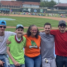 Timothy and his family at the Dragons game 