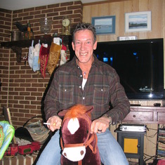 Daddy on Timmy's rocking horse!