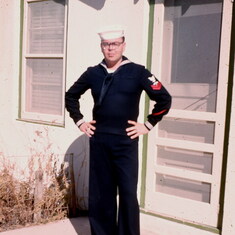 Brady shared this photo. I'm guessing it was about 1957. Probably your first visit home in uniform.