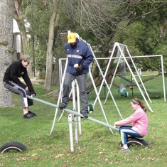 Tom on the seesaw with Maggie & Thomas