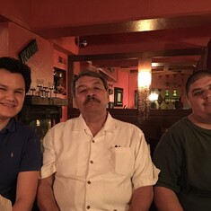 Tony loved a meal out with family, here with stepson Trevor and son Tony (Junior).