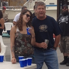 Lizzie teaching how to play beer pong