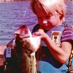 I took him out with me when not fishing in a tournament. It was fun play  time while he was learning to enjoy fishing. This was on Lake Humphrey,OK. This was in Fall of 1983 shortly after we had gotten this boat.