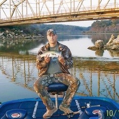 Tournament on Texoma in Oct 2008. Near the bridge over Rooster Creek. Travis got our first keeper.