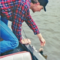 Travis letting one go during a fishing trip to Lake Fork, TX.