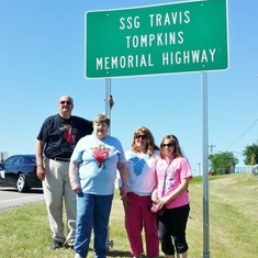 The day a part of a State road was named in his honor .