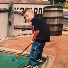 Trevor setting up for a hole in one.
