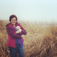 The day we went to get Piper the Puppy. After picking out her perfect puppy, we went to the ocean. Piper was cold so Tricia snuggled her in her coat. 1/24/15