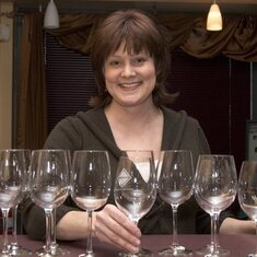 Tricia - always with a smile on her face... and a glass (or two) of wine nearby!