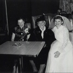 Tuck with Laura, her mother, and Grandma Tacke at her wedding.