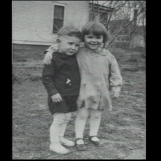 Tuck as a young girl in Carroll with her cousin.