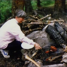 Cooking over the fire on one of many camping trips. 1986.