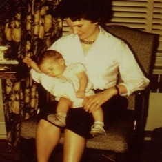 Tuck with baby Suzanne, 1961.