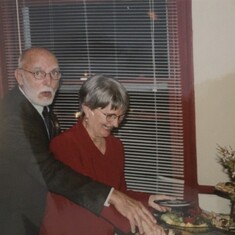 Tuck and Wayne at their 50th wedding anniversary party (with Wayne stealing a cookie, most likely). 2002.