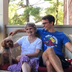 Benjamin, Tuck, and Andy the dog on the porch, c. 2017.