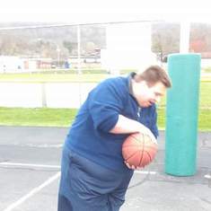 Tyler playing basketball