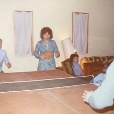 Ty playing ping pong with his mom