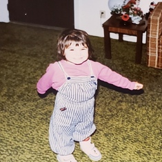 Baby Girl in overalls